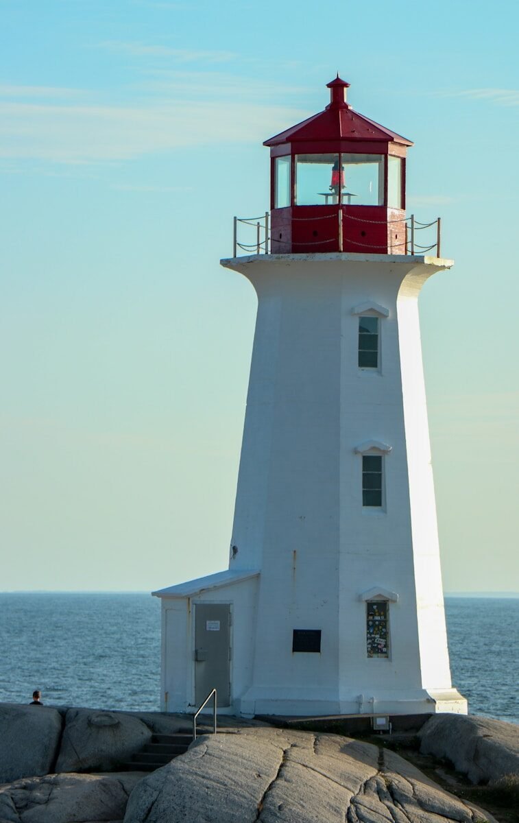 a white and red lighthouse
